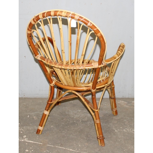 112 - In the manner of Franco Albini, a pair of retro bamboo and wicker chairs, each approx 60cm wide x 47... 