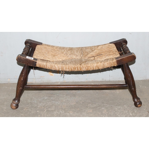 116 - An Arts & Crafts period oak and rush topped footstool, approx 65cm wide x 30cm deep x 34cm tall