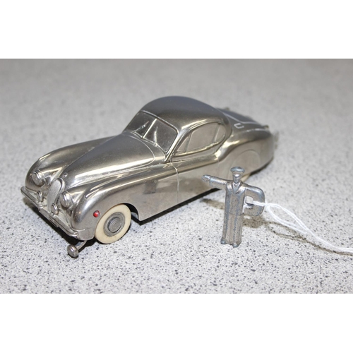 1540 - A rare vintage Prameta Kolner automodelle Jaguar XK120 model wind up car with key, approx 15cm long