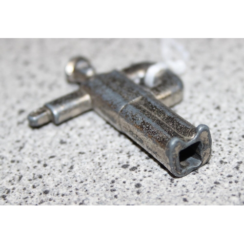 1540 - A rare vintage Prameta Kolner automodelle Jaguar XK120 model wind up car with key, approx 15cm long