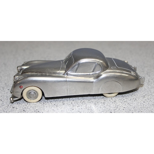 1540 - A rare vintage Prameta Kolner automodelle Jaguar XK120 model wind up car with key, approx 15cm long