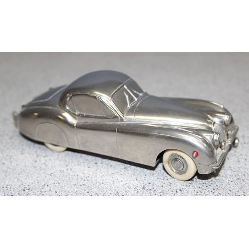 1540 - A rare vintage Prameta Kolner automodelle Jaguar XK120 model wind up car with key, approx 15cm long