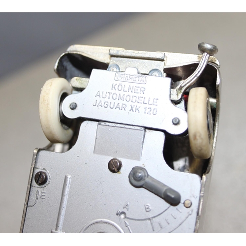 1540 - A rare vintage Prameta Kolner automodelle Jaguar XK120 model wind up car with key, approx 15cm long