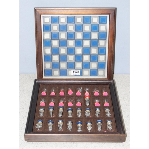 1544 - Franklin Mint 'Battle of Waterloo' chess set with cast pewter pieces standing approx 6cm tall