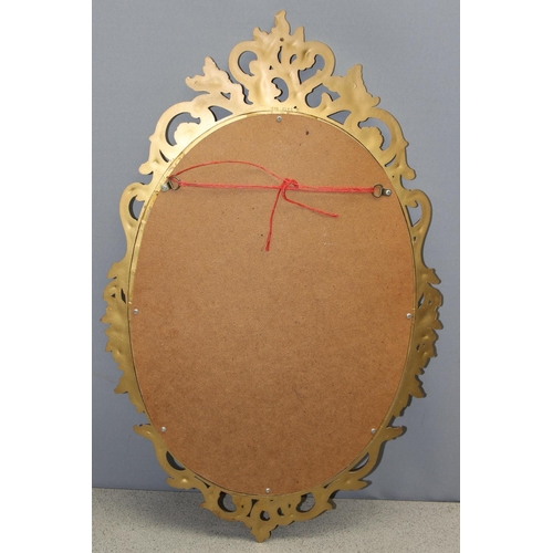 464 - Decorative ornate wall mirror, approx 74 x 46cm