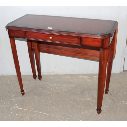 108 - An unusual vintage mahogany hall table with single drawer and drop flap, approx 97cm wide x 83cm dee... 