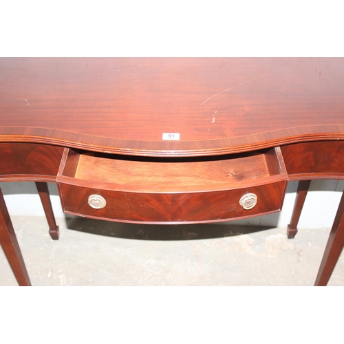 109 - Mahogany serpentine hall table with single drawer, approx 108cm wide x 50cm deep x 84cm tall