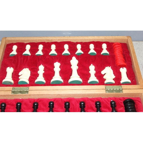 1551 - Boxed wooden chess set and board to incl draughts pieces, and a further chess set in wooden box