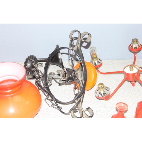 259 - 2 hanging lights to incl retro 5-arm chandelier in red, a vintage orange glass shaded lamp and a saf... 