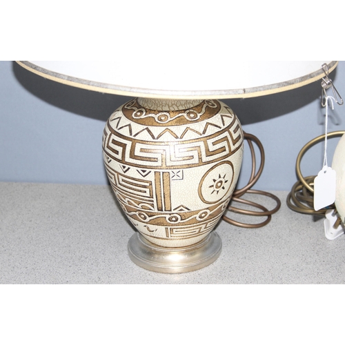 260 - 3 pottery lamps, one with gilt Grecian design, one with floral decoration and a blue glazed pottery ... 