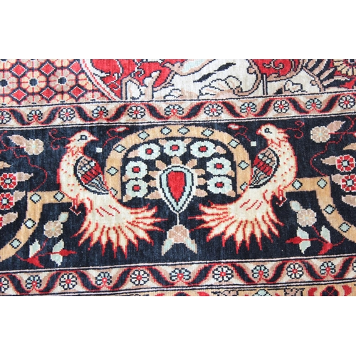 213 - A superb quality hand made Persian silk decorative red ground rug, fine quality knot structure, appr... 