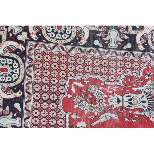 213 - A superb quality hand made Persian silk decorative red ground rug, fine quality knot structure, appr... 