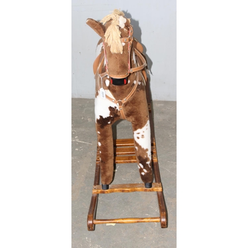 1562 - Child's stuffed rocking horse on wooden base, approx 144cm W x 104cm H x 38cm D