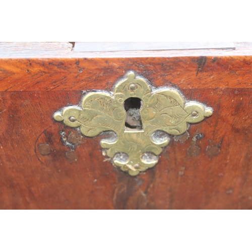 1 - A late 17th or early 18th century 2 over 3 chest of drawers with bun feet and later Georgian brass h... 