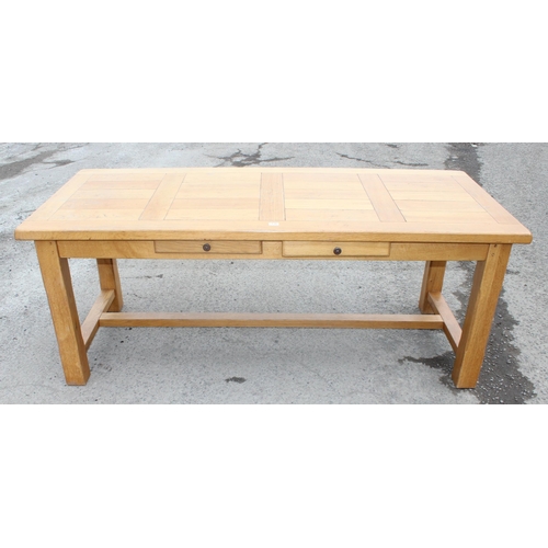 136 - Large light oak dining or refectory table with 2 drawers and 2 extending leaves and a set of 6 light... 