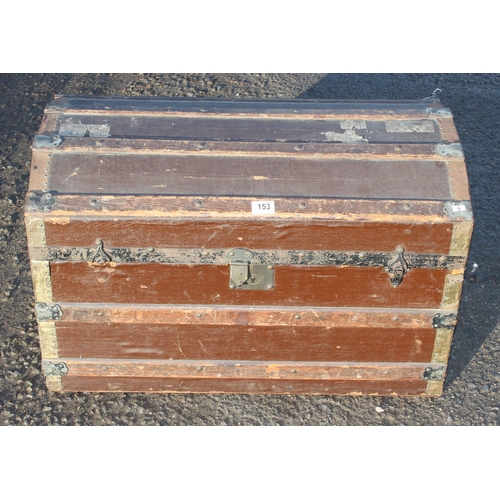 153 - An antique dome topped shipping trunk with wooden slats, some vintage labels, approx 76cm wide x 42c... 