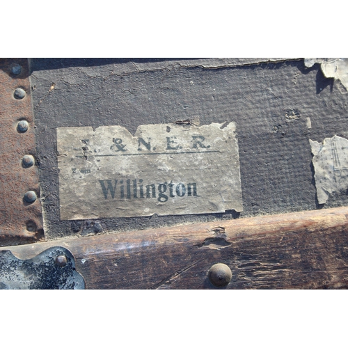 153 - An antique dome topped shipping trunk with wooden slats, some vintage labels, approx 76cm wide x 42c... 