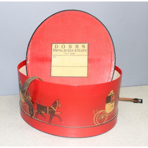 292 - Vintage hat box from Dobbs of Fifth Avenue, New York, with buckled leather strap and decorated with ... 