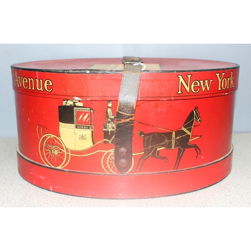 292 - Vintage hat box from Dobbs of Fifth Avenue, New York, with buckled leather strap and decorated with ... 