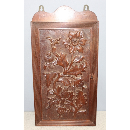 299G - Vintage carved mahogany wall hanging key board with floral and bird design, approx 30cm wide x 6cm d... 