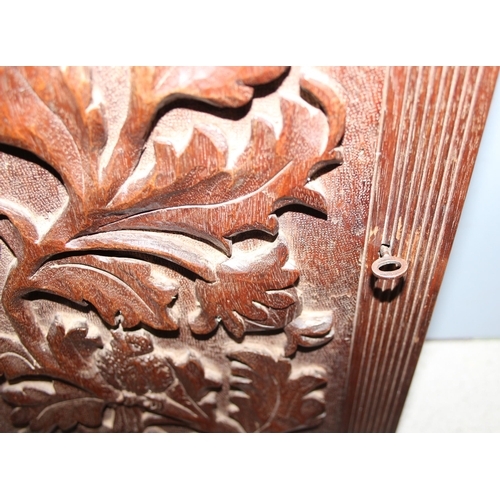 299G - Vintage carved mahogany wall hanging key board with floral and bird design, approx 30cm wide x 6cm d... 