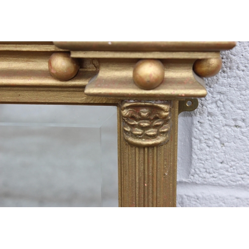 493 - Large antique style gilt-wooden framed over-mantel mirror with Corinthian column decoration, approx ... 