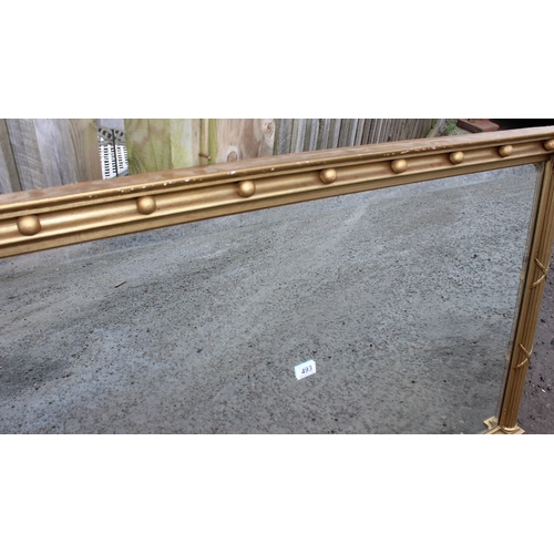 493 - Large antique style gilt-wooden framed over-mantel mirror with Corinthian column decoration, approx ... 