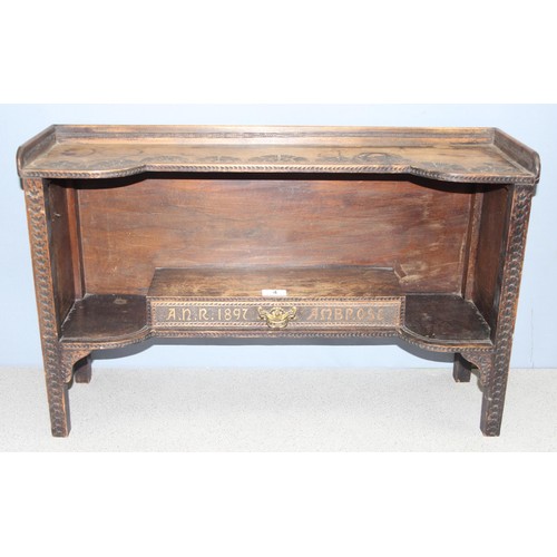 4 - A superb late 19th century Arts & Crafts period oak box shelf with carved details, the drawer carved... 