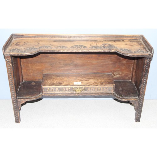 4 - A superb late 19th century Arts & Crafts period oak box shelf with carved details, the drawer carved... 