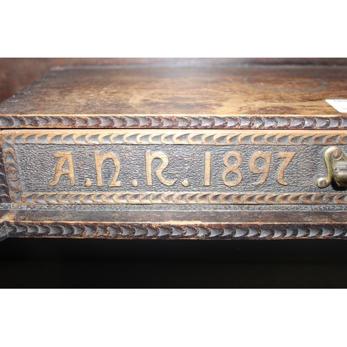 4 - A superb late 19th century Arts & Crafts period oak box shelf with carved details, the drawer carved... 