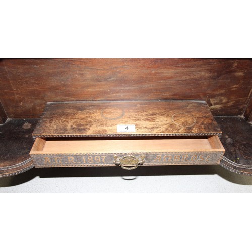 4 - A superb late 19th century Arts & Crafts period oak box shelf with carved details, the drawer carved... 