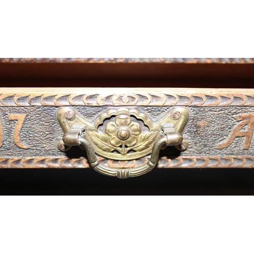 4 - A superb late 19th century Arts & Crafts period oak box shelf with carved details, the drawer carved... 