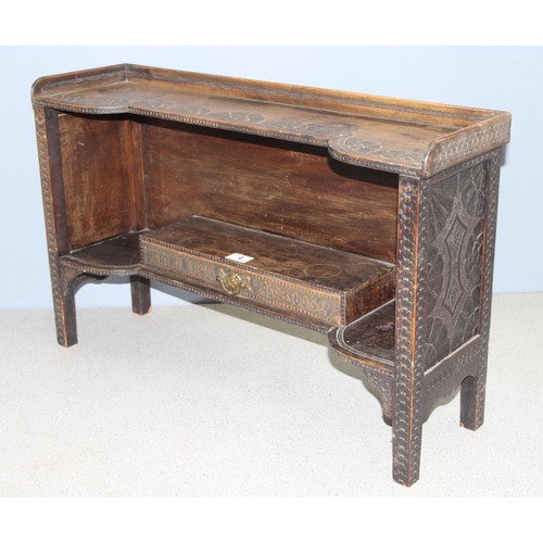 4 - A superb late 19th century Arts & Crafts period oak box shelf with carved details, the drawer carved... 