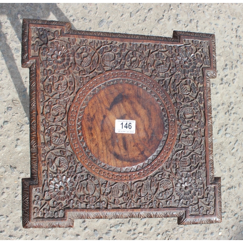 146 - An early 20th century Indian carved hardwood side table with undertier, approx 39cm wide x 39cm deep... 