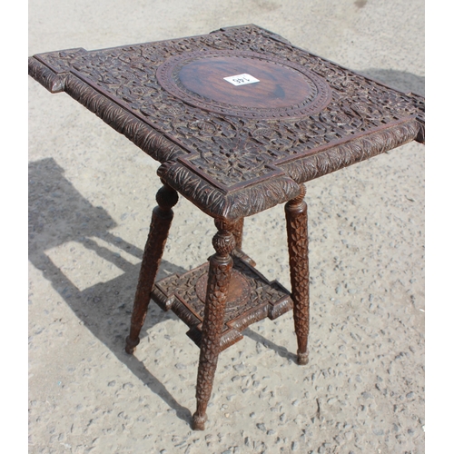 146 - An early 20th century Indian carved hardwood side table with undertier, approx 39cm wide x 39cm deep... 