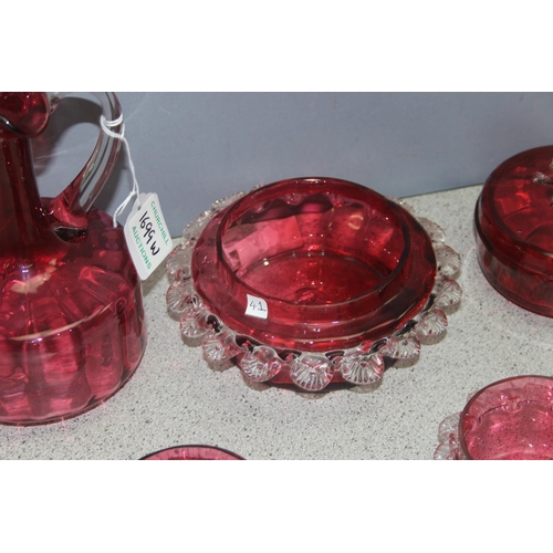 1699W - 5 pieces of vintage cranberry glassware to incl jug, bowls, and lidded pot