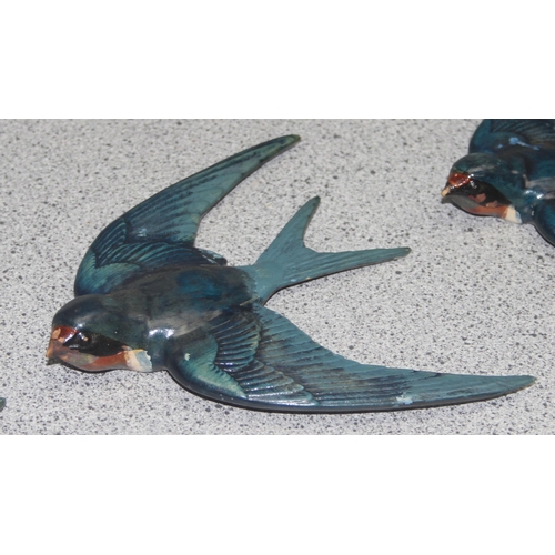 1699Y - Set of 3 ceramic graduated swallows in flight in the manner of Beswick, largest wingspan approx 16cm