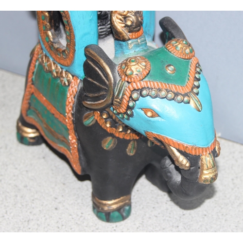 1803 - Ceramic model of an Indian elephant, approx 27cm tall, and a small metal elephant hanging tealight c... 