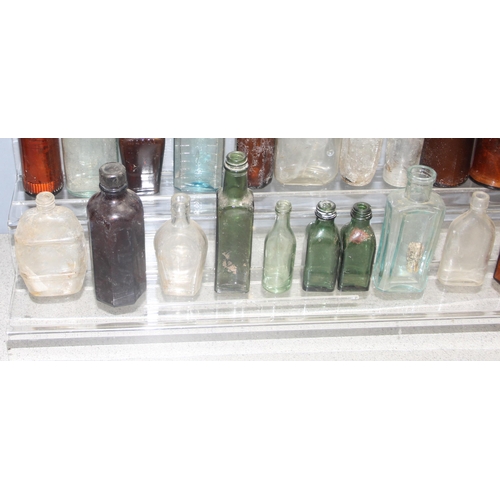 1805 - Qty of antique and later glass bottles in small metal trunk