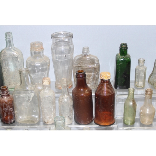 1805 - Qty of antique and later glass bottles in small metal trunk