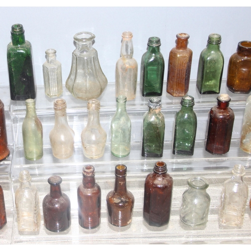 1805 - Qty of antique and later glass bottles in small metal trunk