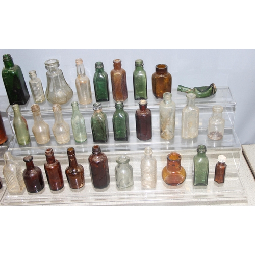 1805 - Qty of antique and later glass bottles in small metal trunk