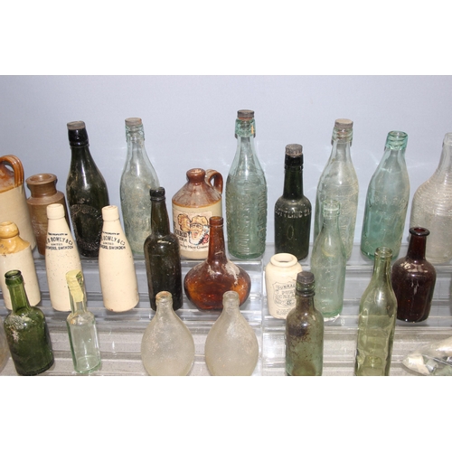 1807 - Qty of antique and later glass bottles incl Monsters, Newbury Brewery, and stoneware bottle, some ad... 