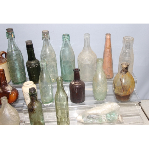 1807 - Qty of antique and later glass bottles incl Monsters, Newbury Brewery, and stoneware bottle, some ad... 