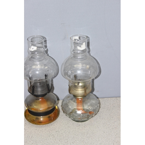 265 - 5 vintage oil lamps, some with glass shades, tallest approx 57cm