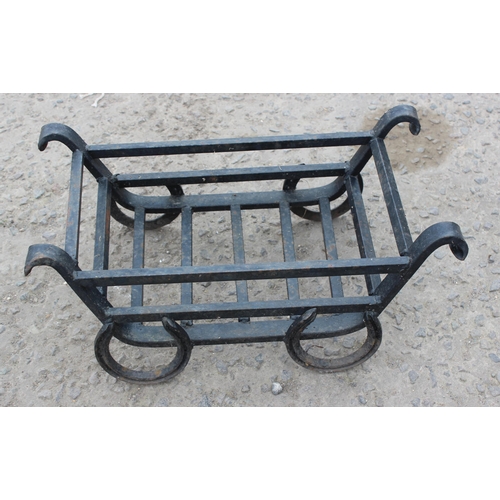 392 - A vintage garden obelisk and a wrought iron garden basket or fire basket, the obelisk approx 42cm de... 