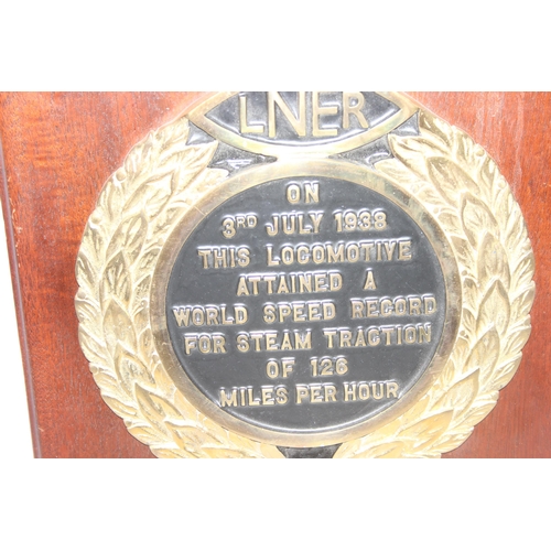 442A - A limited edition (247/250) black enamel and brass LNER commemorative plaque mounted on wooden back,... 