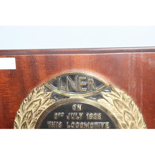 442A - A limited edition (247/250) black enamel and brass LNER commemorative plaque mounted on wooden back,... 