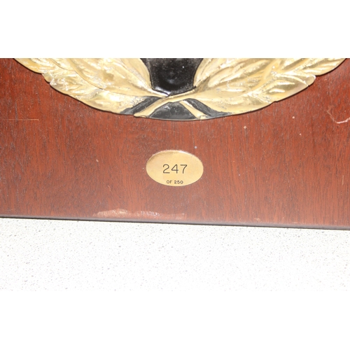 442A - A limited edition (247/250) black enamel and brass LNER commemorative plaque mounted on wooden back,... 