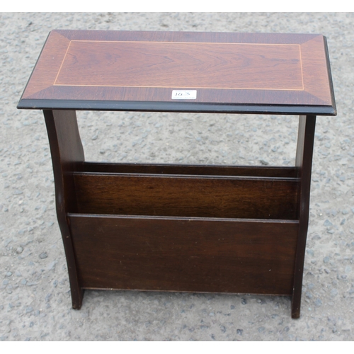 143 - A small side table formed as a drum and a leather topped magazine rack table (2)